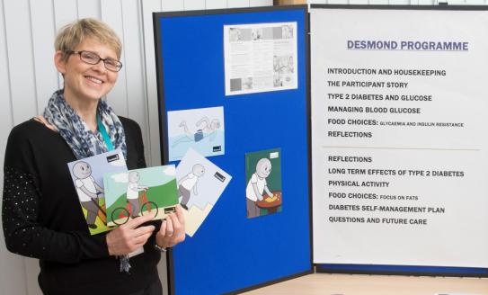 Ellen McDonagh with informational leaflets.