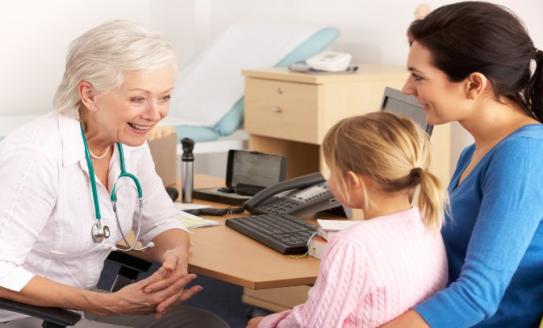 doctor talking to child