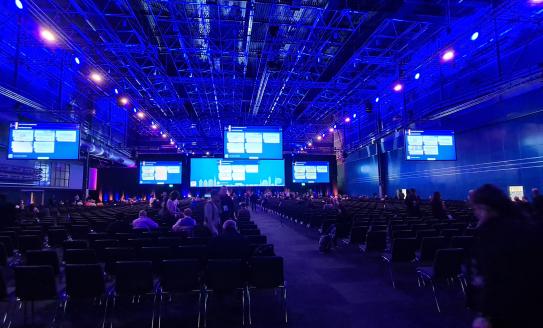 Audience attending a presentation