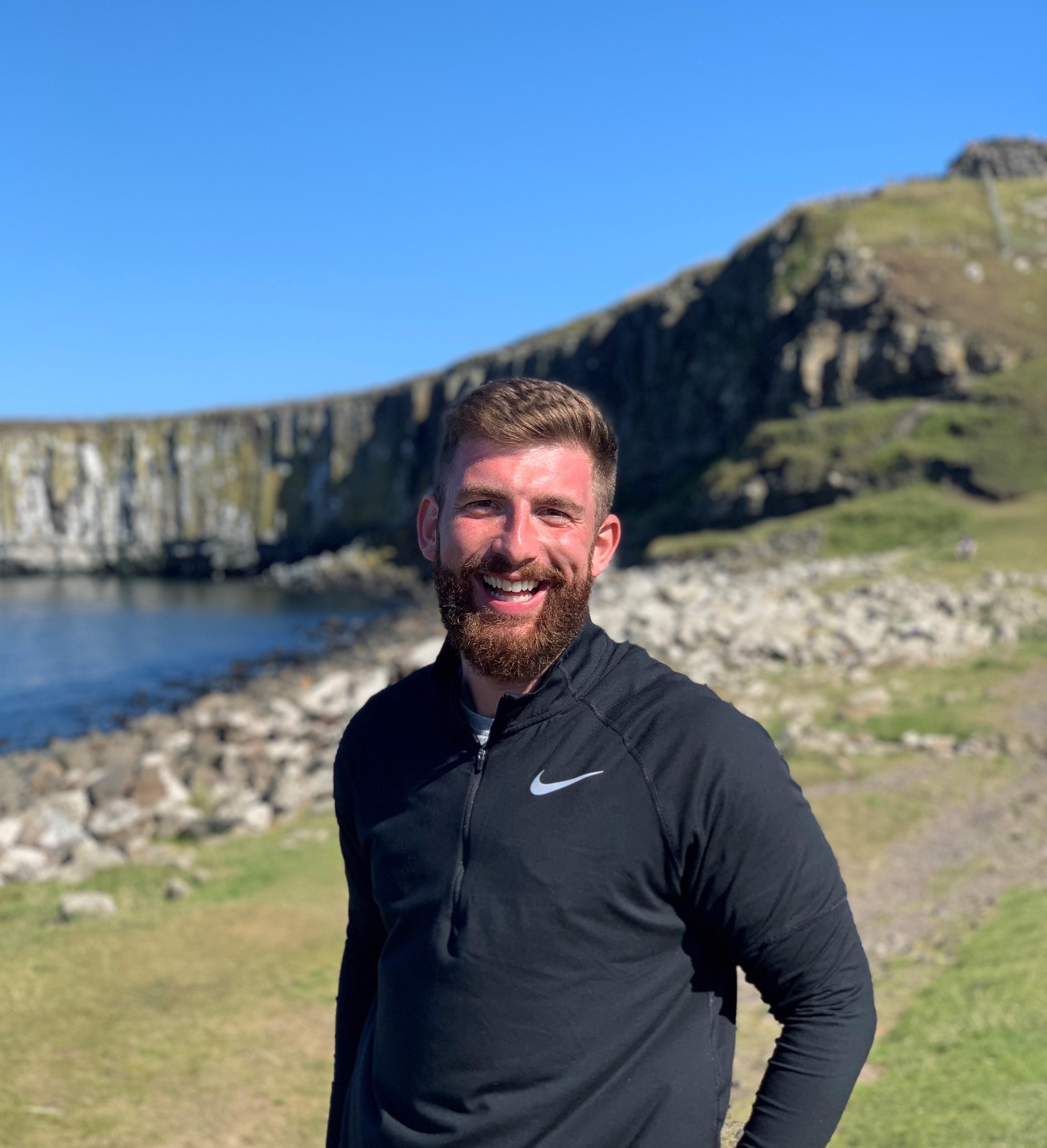 George West walking near cliffs