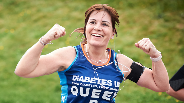 Lady running and raising arms 