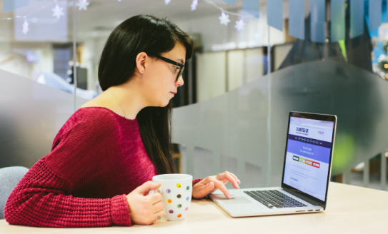 Woman looking at computer